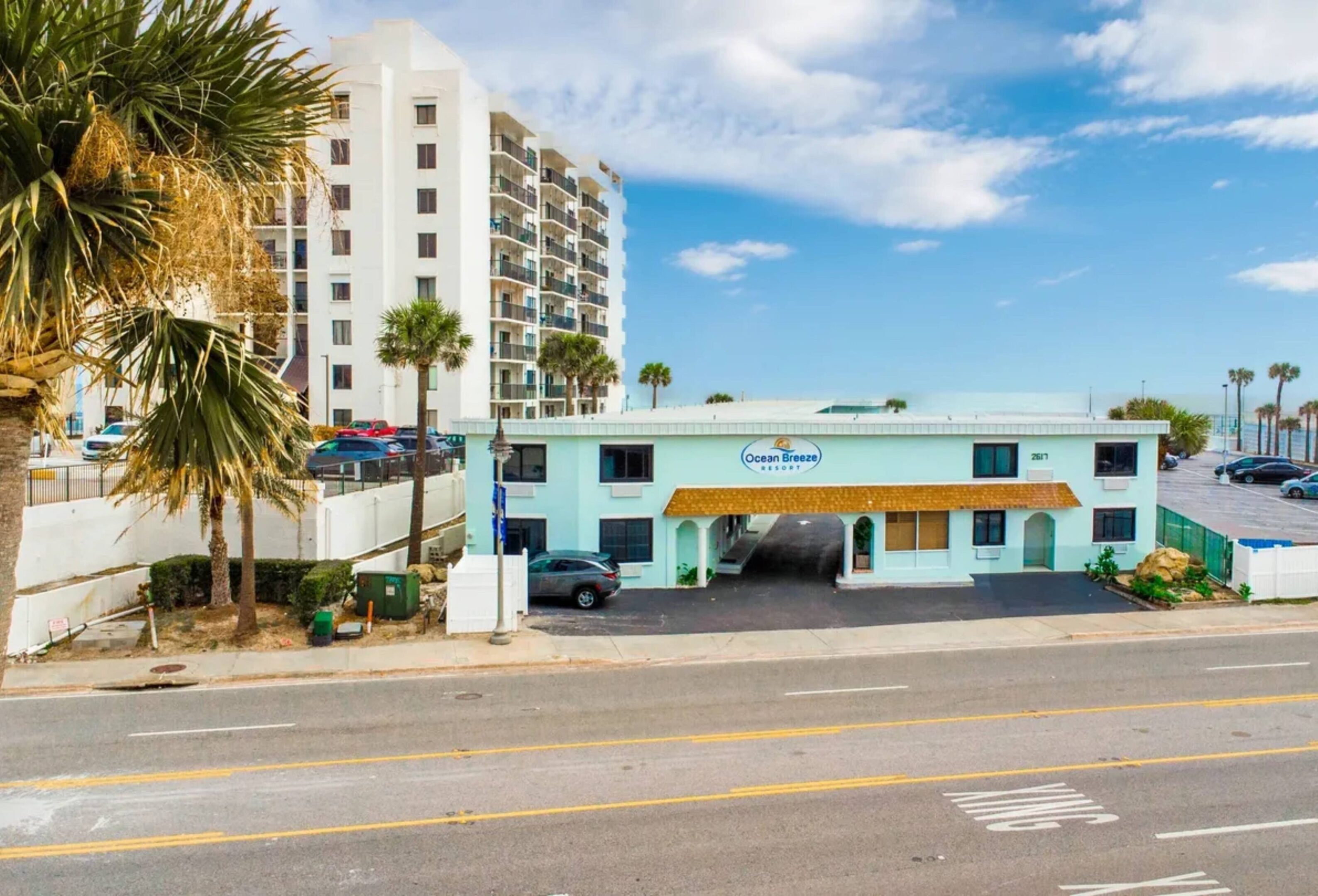 Coastal motel with palm trees