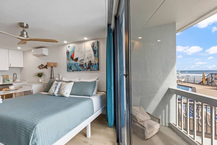 Seaside bedroom with balcony and ocean view