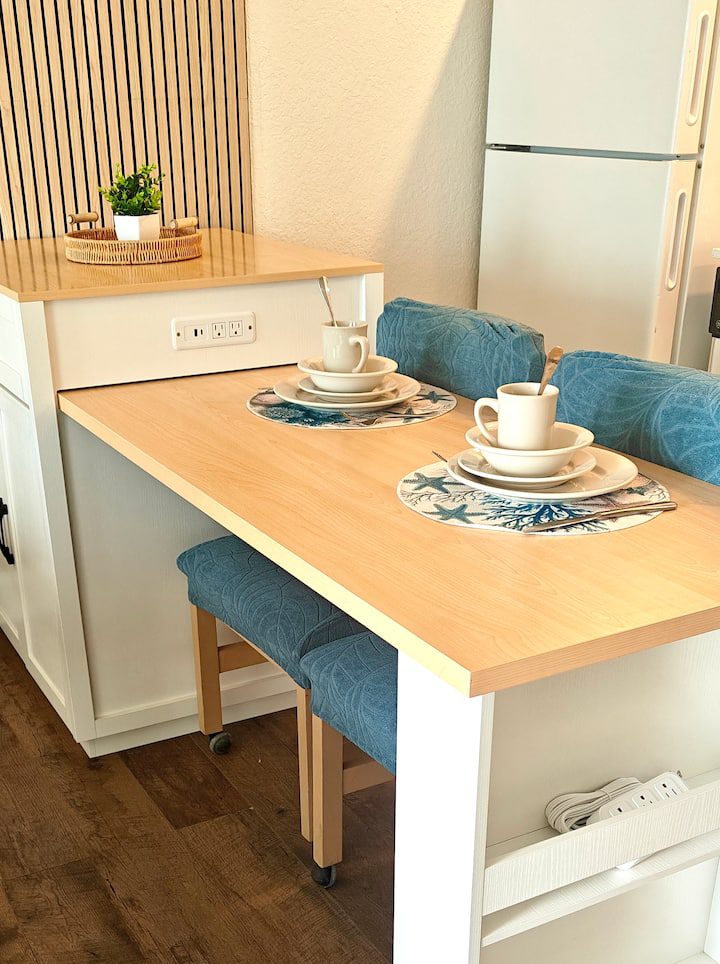 Cozy kitchen breakfast bar with two place settings