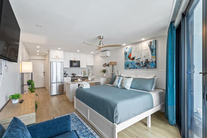 Bright modern studio apartment with kitchenette