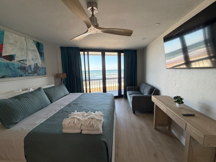 Ocean-view hotel room with king bed