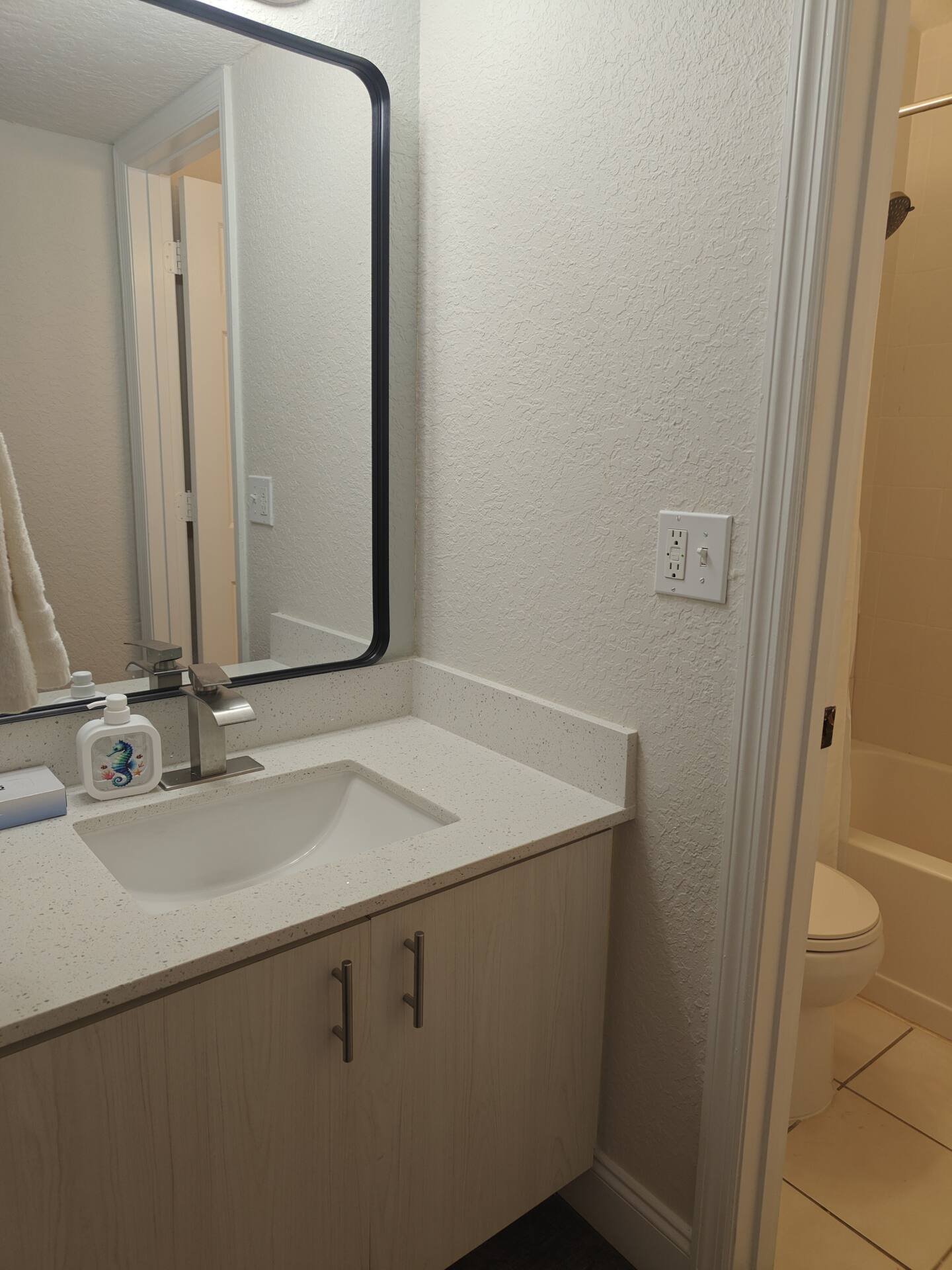 Modern bathroom vanity with sink and mirror