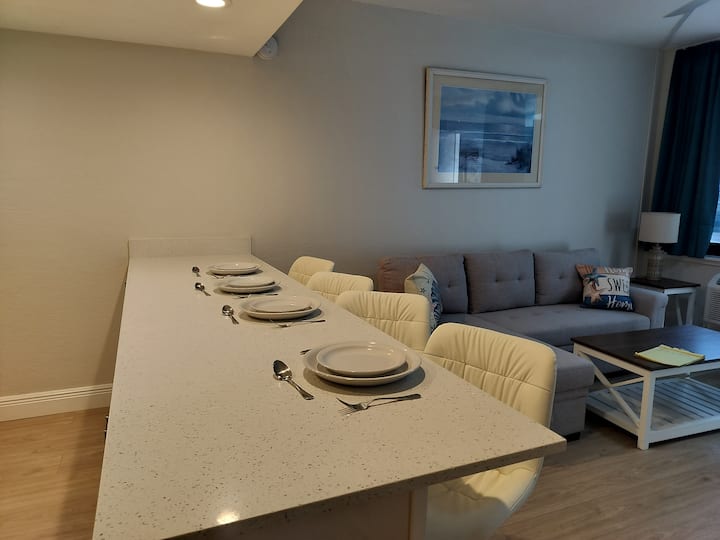 Modern kitchen island with four place settings