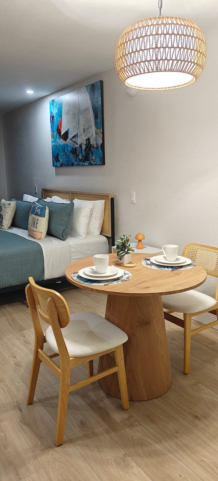 Cozy studio dining area with bed