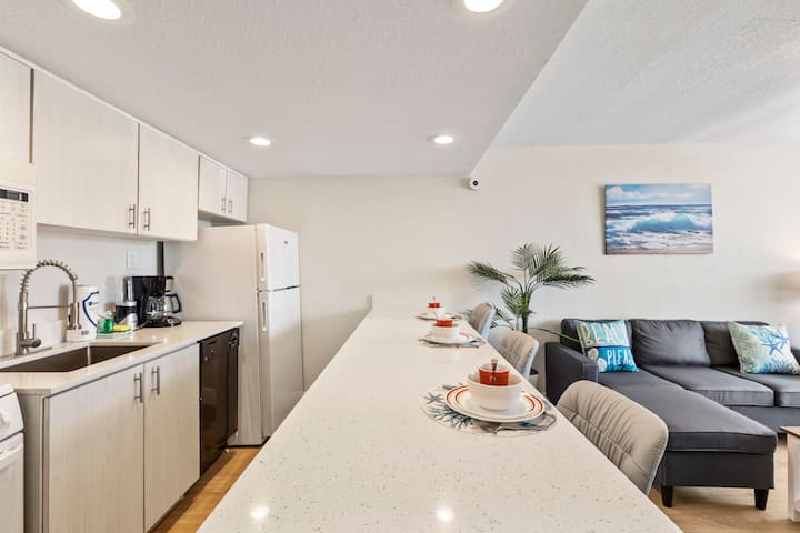 Open-concept kitchen with long breakfast bar