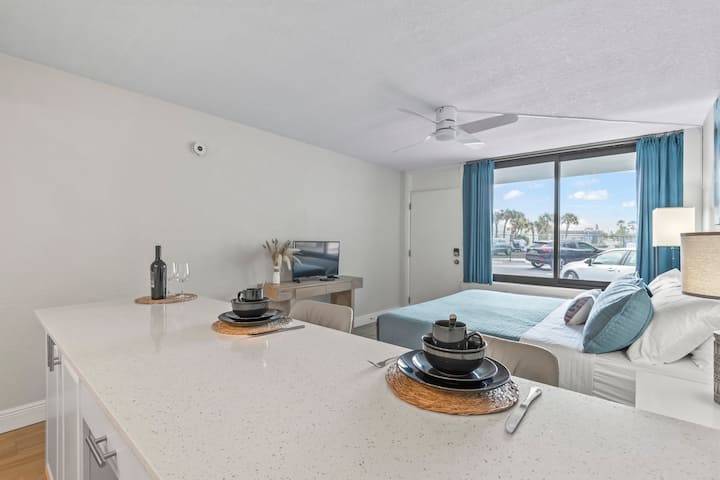 Studio apartment interior with waterfront view