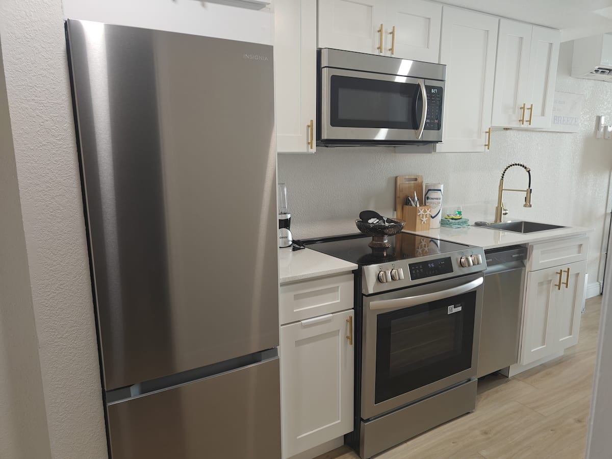 Modern kitchen with stainless steel appliances