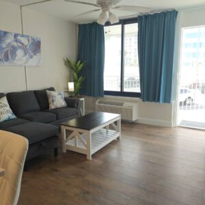 Cozy apartment living room with blue curtains