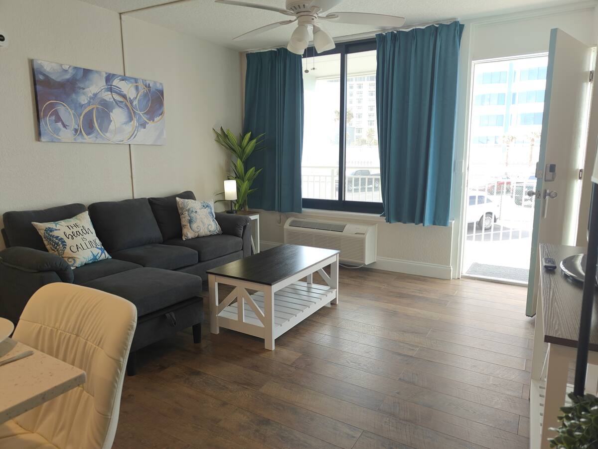 Cozy apartment living room with blue curtains